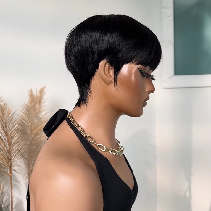 Vintage Chic Pixie Cut with Natural Hair Full Bangs Drawn Sideburns