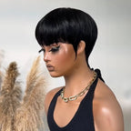 Vintage Chic Pixie Cut with Natural Hair Full Bangs Drawn Sideburns